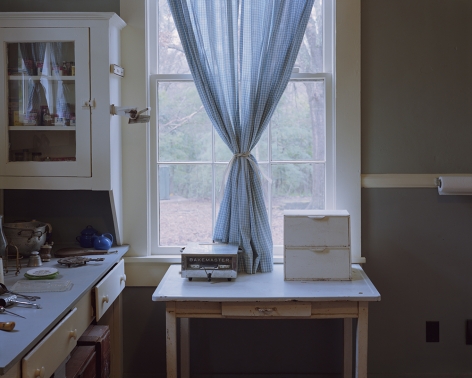 Tema Stauffer  William Faulkner's Kitchen Curtains, Rowan Oak, Oxford, MS, 2018  Archival Pigment Print  42h x 50 1/2w in. Photograph of William Faulkners Kitchen with blue gingham curtains