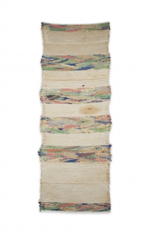 large fiberwork in muted cream and with bands of multiple primary colored lines.