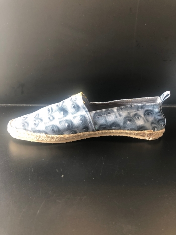 Randy Shull  Custom Randy "Eye" Shoes Sizes vary, 2019  Fabric, rubber, jute  Dimensions Variable  RS_030  $ 75.00, fabric shoes with photos of eyes across them